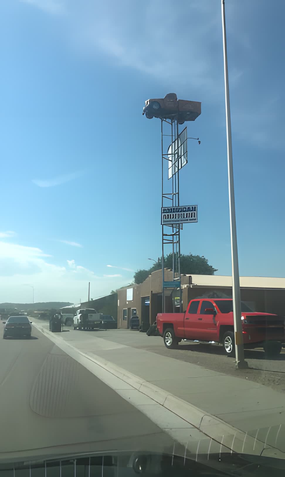 American Muffler & Towing sign tower on N 9th Street, Gallup NM
